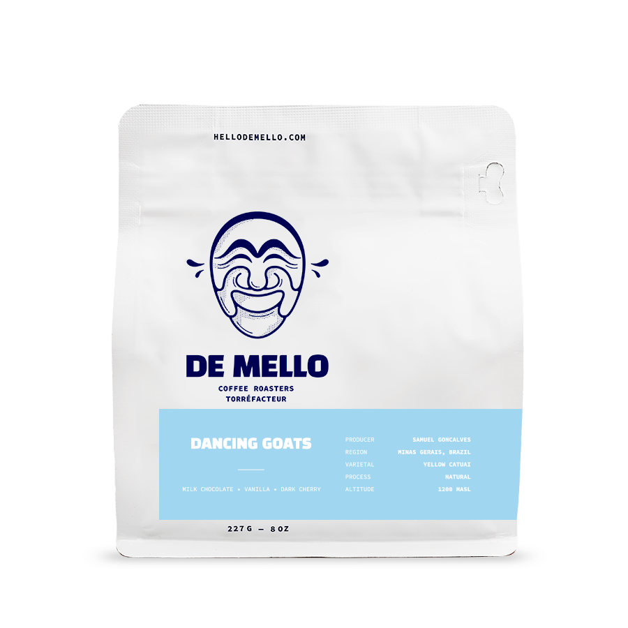 De Mello Coffee - Dancing Goats - Whole Bean - De Mello Coffee bag beside a honey jar, showcasing the perfect pairing.